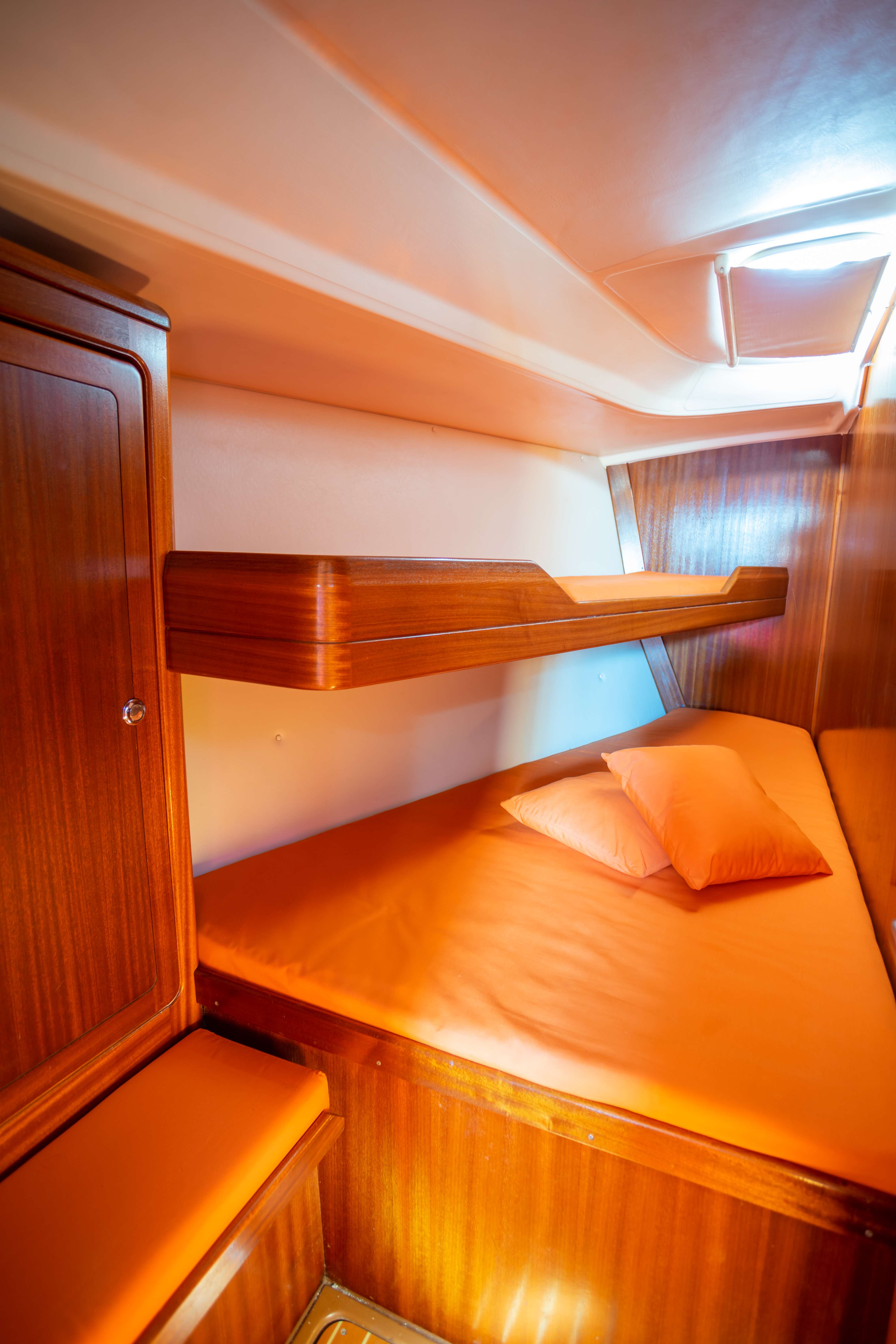 Sleeping quarters with bunk beds and storage