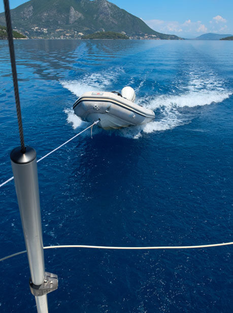 Tender boat being towed behind My Way