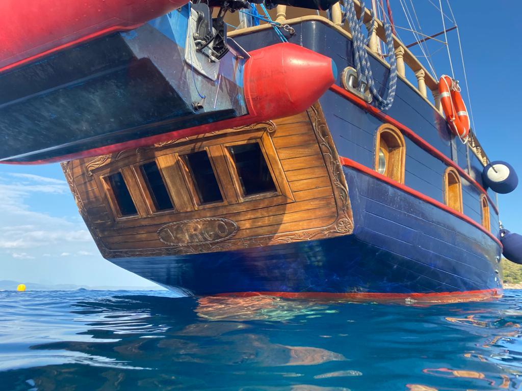 Close-up of Virgo's stern showing the name carved into the wooden transom